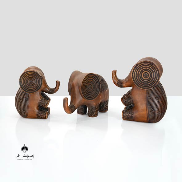 Wood-effect elephant family of three فیل خانواده 3 تایی طرح چوب